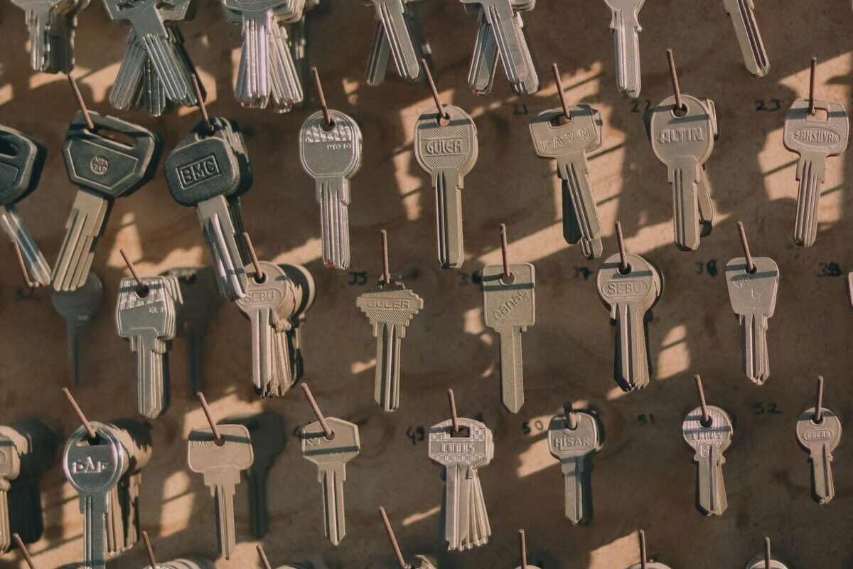 things to declutter small home fast – assorted keys hanging on wall hooks