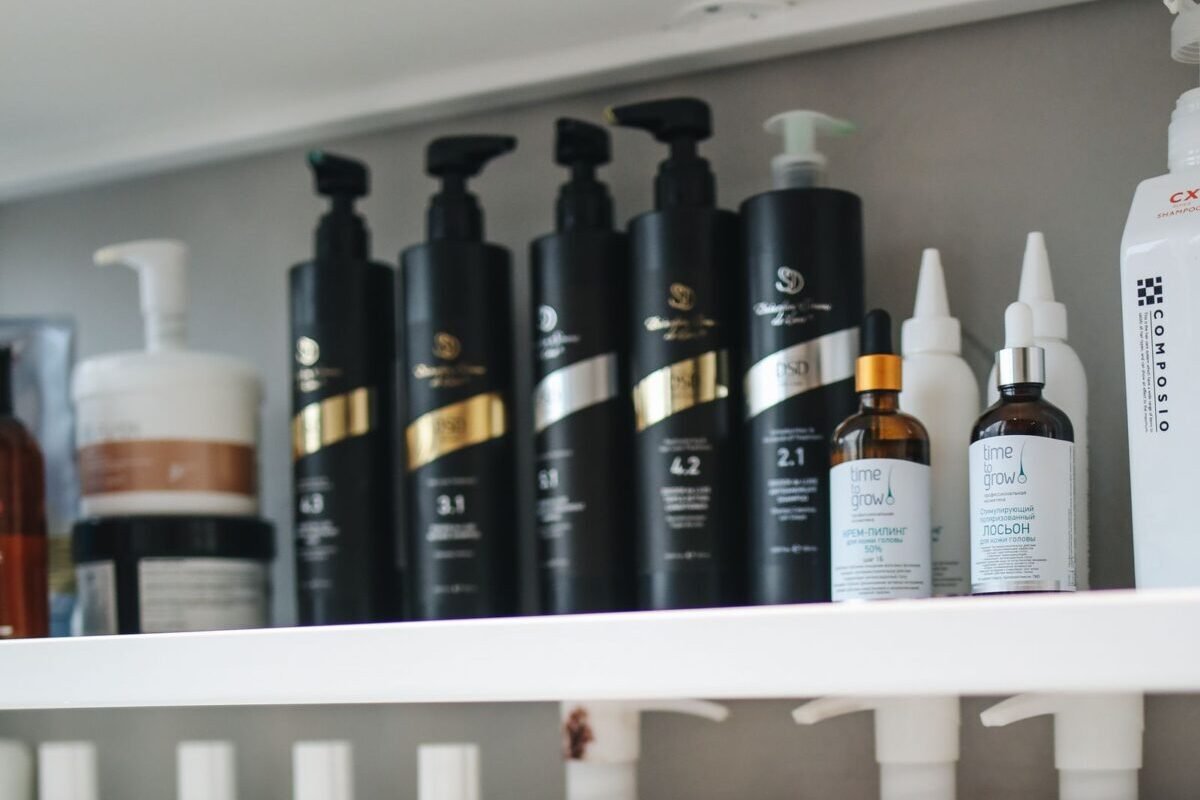 things to declutter small home fast – shampoo and conditioner bottles on bathroom shelves