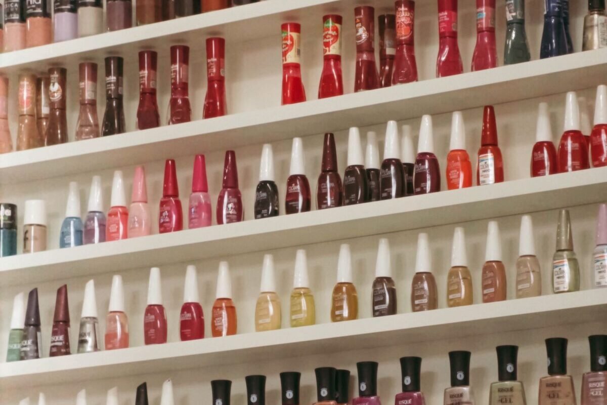 things to declutter small home fast – nail polish bottles lined up on shelves