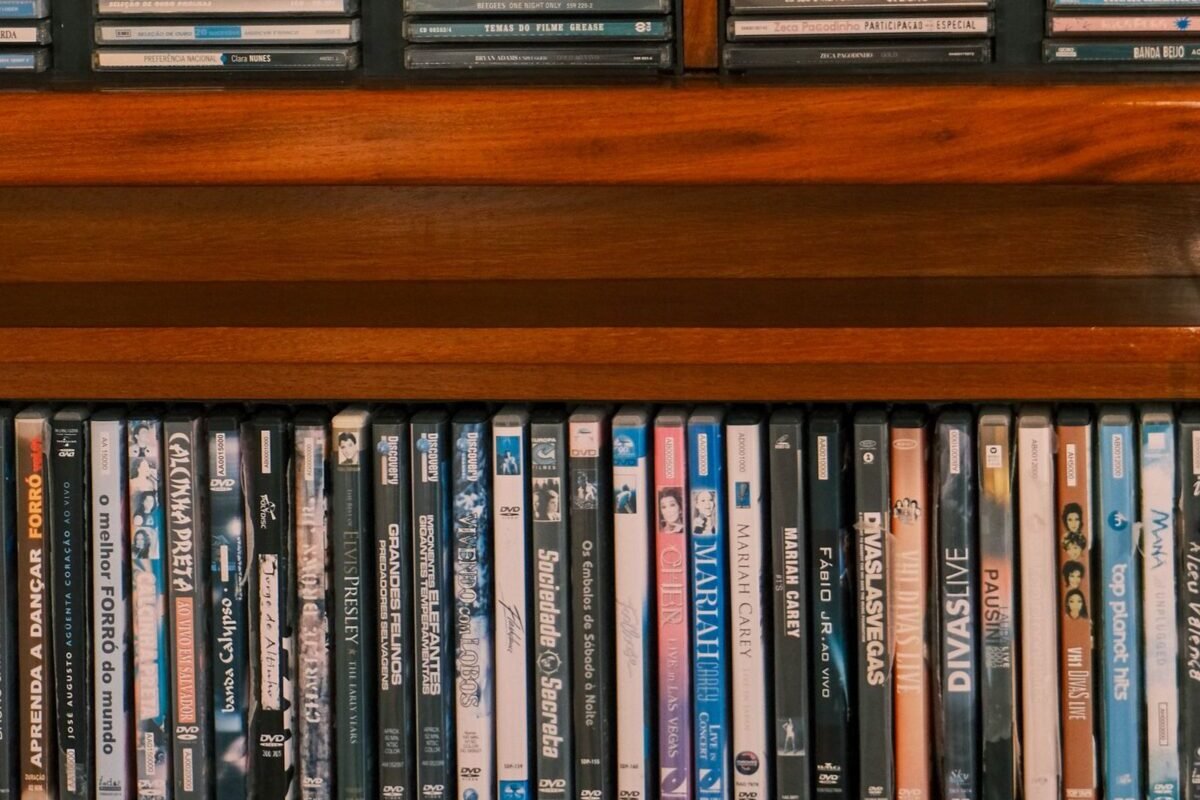 things to declutter small home fast – shelves of old DVDs and CDs in their cases